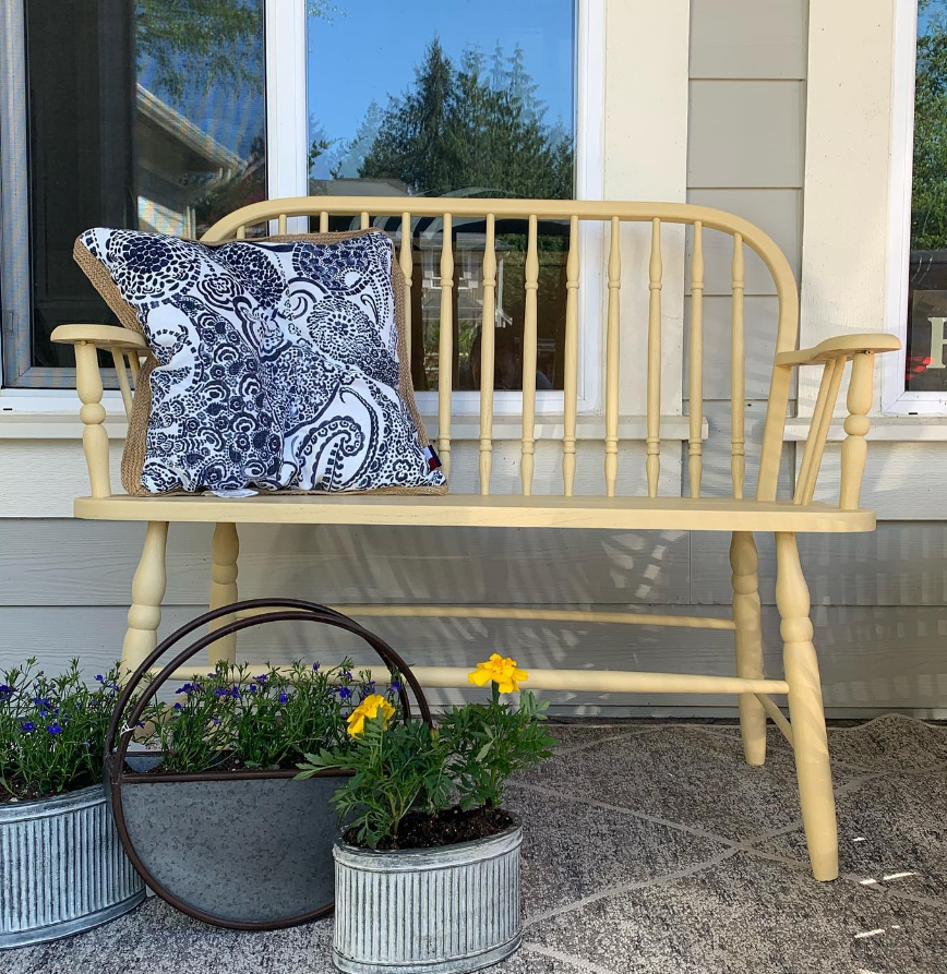 Light yellow painted spindle bench seat