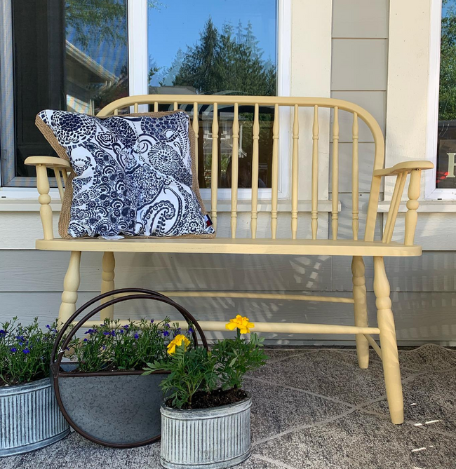 Light yellow painted spindle bench seat