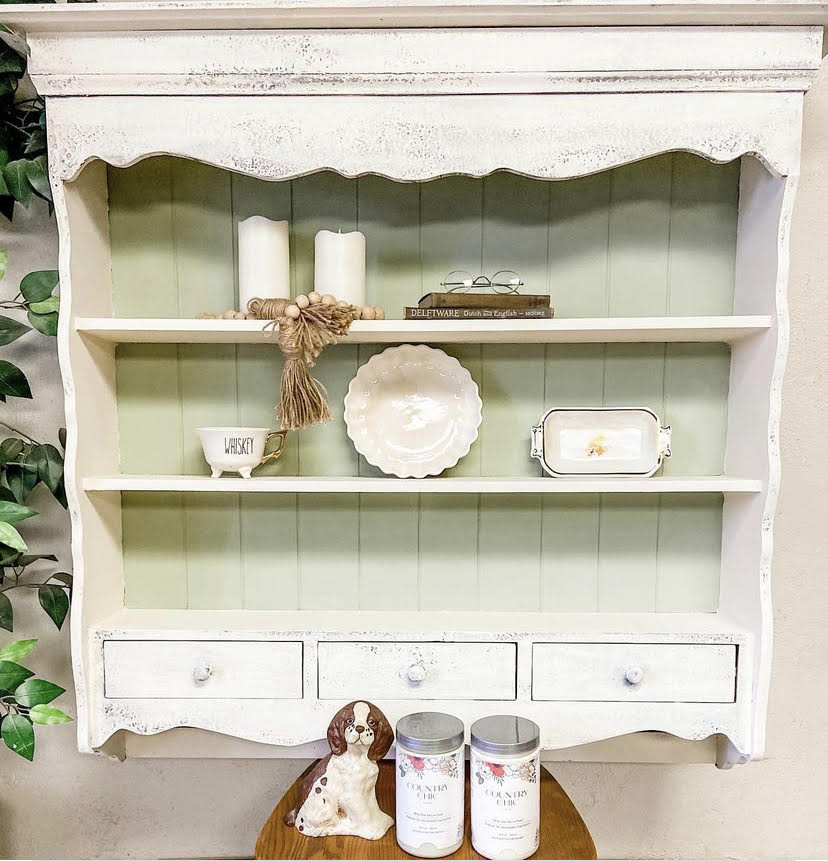 White and sage green farmhouse shelving cabinet