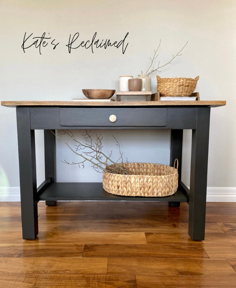 Dark brown console entryway table with natural wood top and woven basket storage