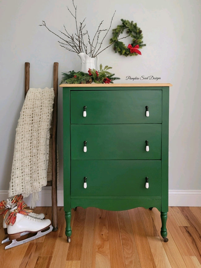 Emerald green painted tallboy dresser with blanket ladder