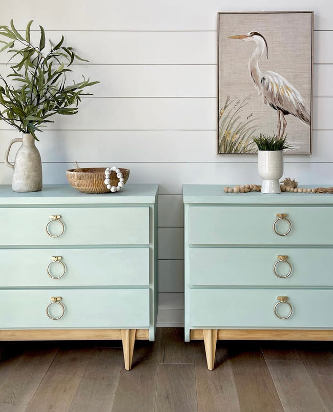 Mint green painted matching nightstands with gold circle pulls