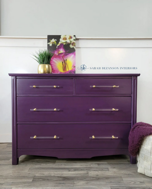 dark purple painted dresser with gold acrylic pulls