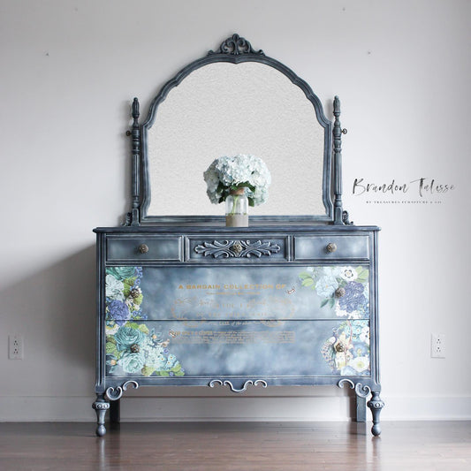 Blended dry brushed blue dresser with floral designs