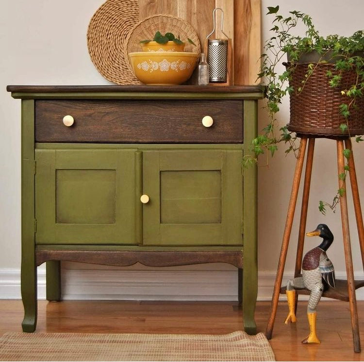 Moss green painted cabinet washstand with dark stained wood accents