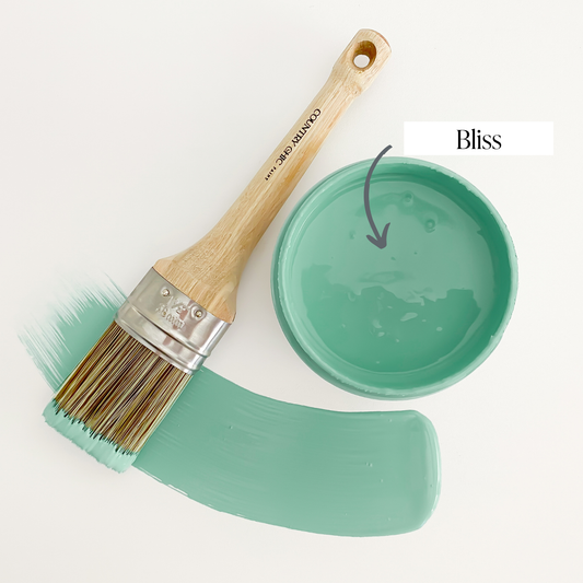 Top view of an open 16oz jar of Country Chic Chalk Style All-In-One Paint in the color Bliss. Muted teal.