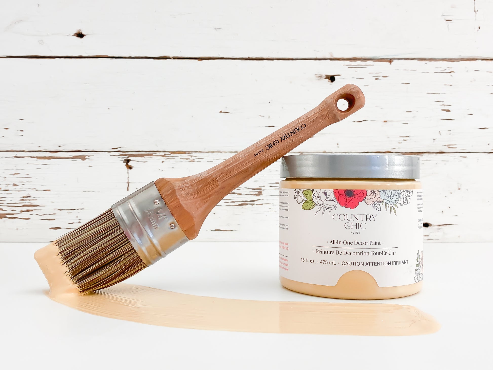 16oz jar of Country Chic Chalk Style All-In-One Paint in the color Bee's Knees. Muted pastel yellow.