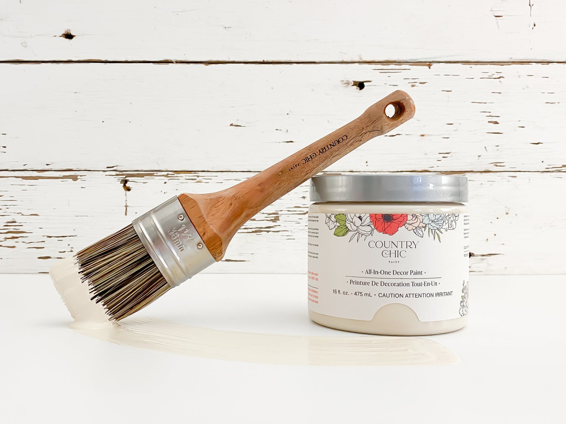 16oz jar of Country Chic Chalk Style All-In-One Paint in the color Cheesecake. Creamy off-white.