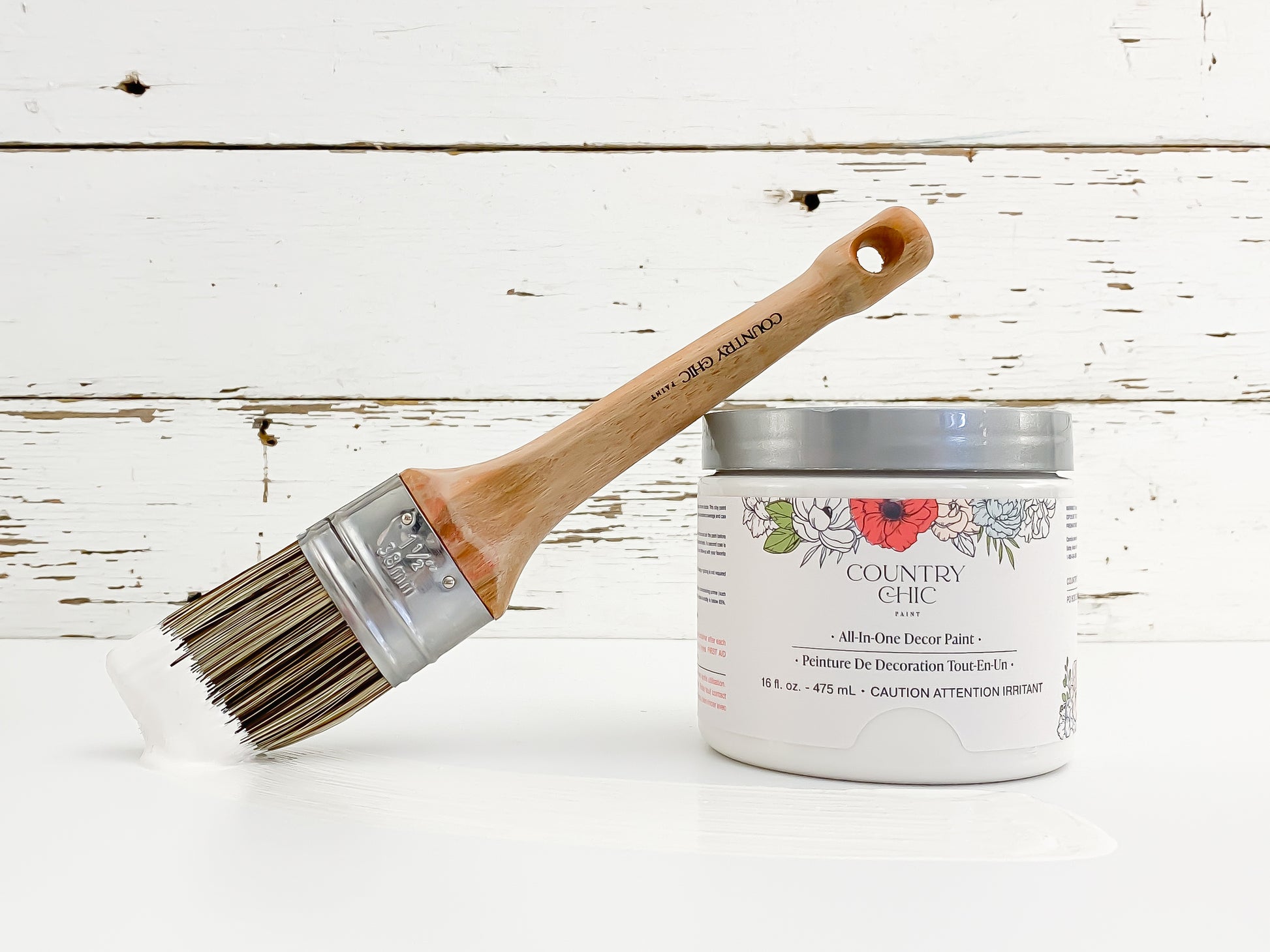 16oz jar of Country Chic Chalk Style All-In-One Paint in the color Crinoline. Crisp white.