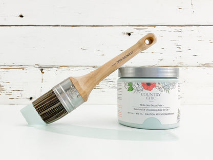 16oz jar of Country Chic Chalk Style All-In-One Paint in the color Fancy Frock. Icy blue.