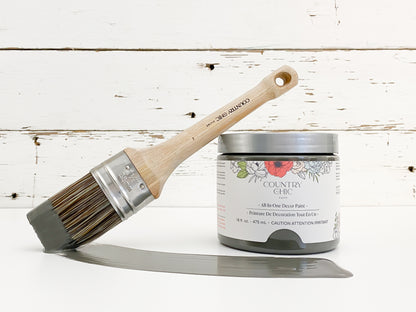 16oz jar of Country Chic Chalk Style All-In-One Paint in the color Rocky Mountain. Charcoal grey.