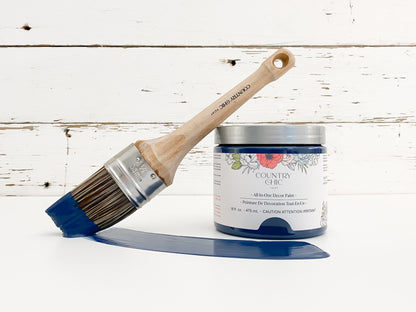 16oz jar of Country Chic Chalk Style All-In-One Paint in the color  Starstruck. Dark blue.