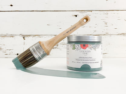 16oz jar of Country Chic Chalk Style All-In-One Paint in the color Wanderess. Deep sea green.