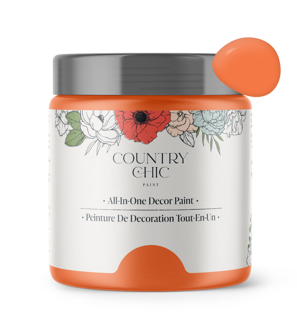 16oz jar of Country Chic Chalk Style All-In-One Paint in the color Persimmon. Citrus orange.