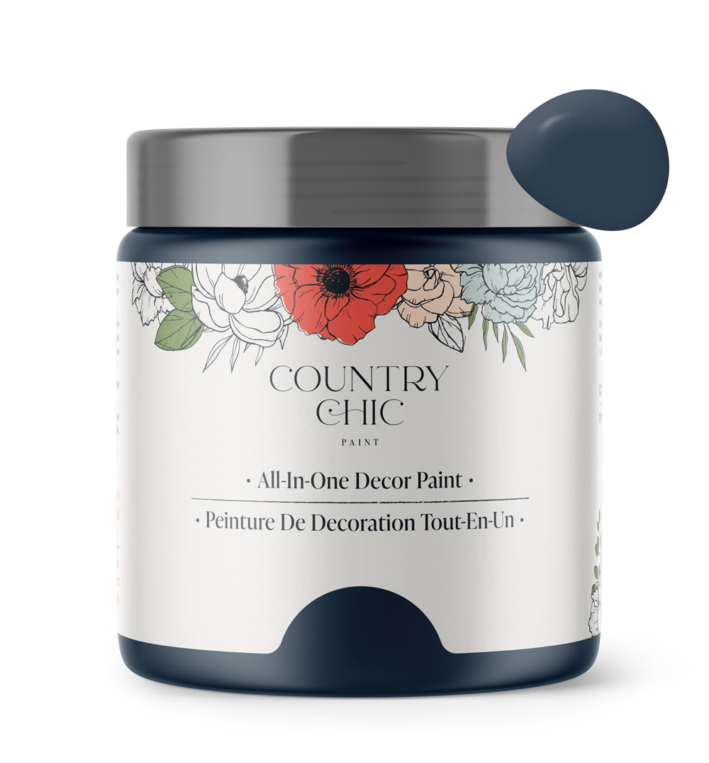 16oz jar of Country Chic Chalk Style All-In-One Paint in the color Peacoat. Deep navy.