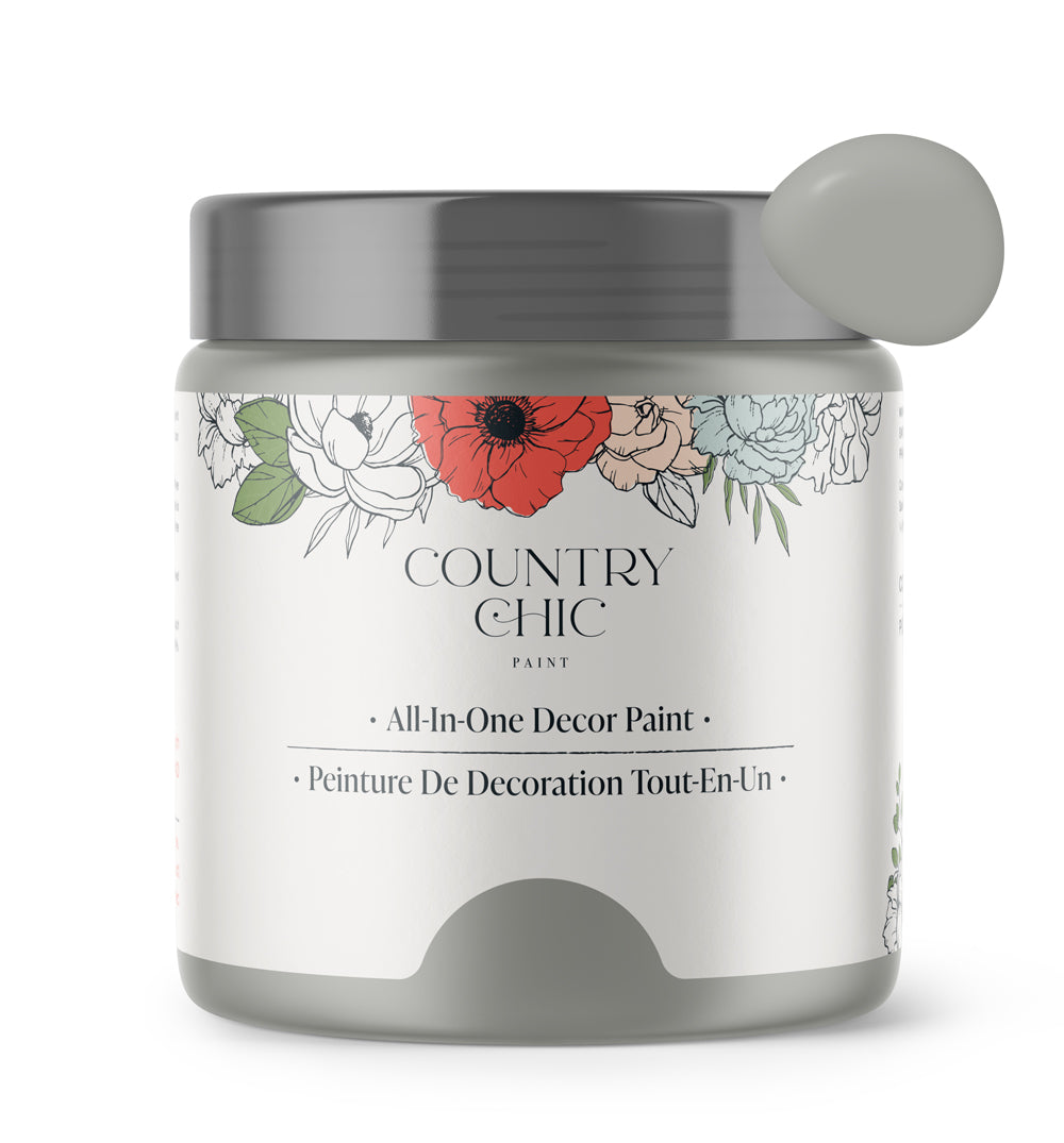 16oz jar of Country Chic Chalk Style All-In-One Paint in the color Pebble Beach. Mid-tone grey.