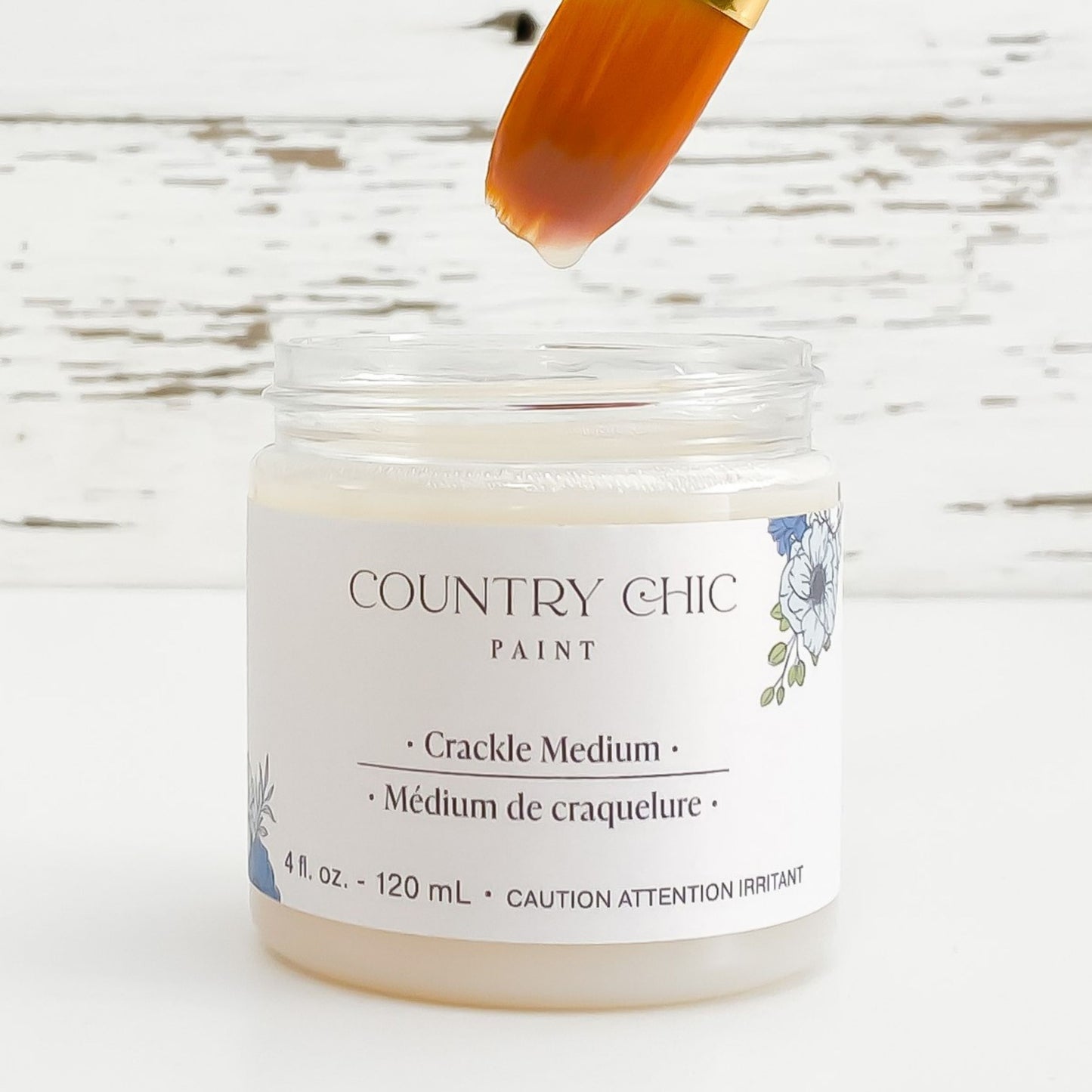 Jar of Country Chic Paint Crackle Medium with small artist paint brush dipped in