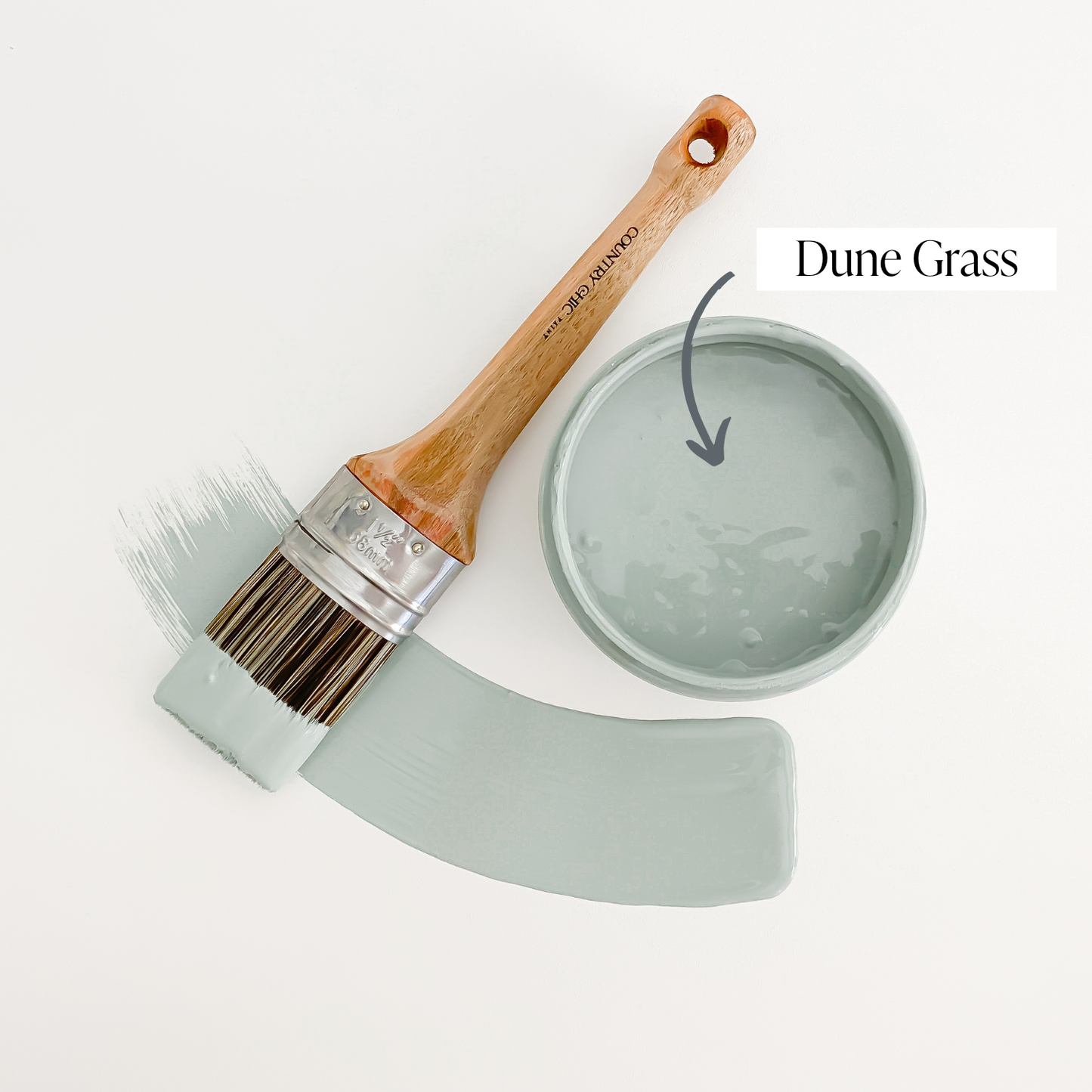 Top view of an open 16oz jar of Country Chic Chalk Style All-In-One Paint in the color Dune Grass. Muted green.