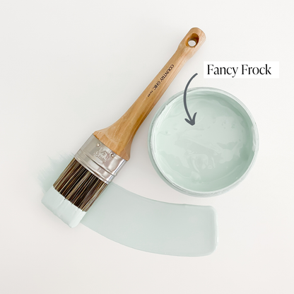 Top view of an open 16oz jar of Country Chic Chalk Style All-In-One Paint in the color Fancy Frock. Icy blue.