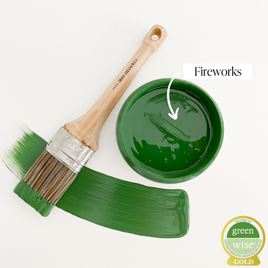 Top view of an open 16oz jar of Country Chic Chalk Style All-In-One Paint in the color Fireworks. Emerald green.