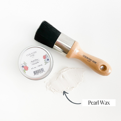 Flatlay of shimmery pearl wax from country chic paint next to wax brush and smear of wax