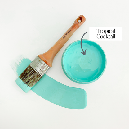 Top view of an open 16oz jar of Country Chic Chalk Style All-In-One Paint in the color Tropical Cocktail. Turquoise.